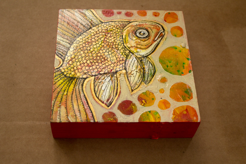 miniature painting of a goldfish